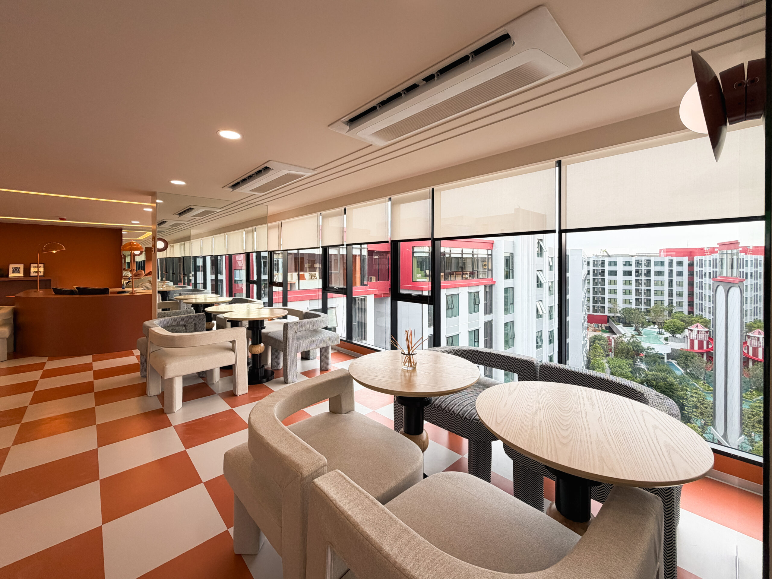 Sky Café — พื้นส้ม-ขาว lounge chairs